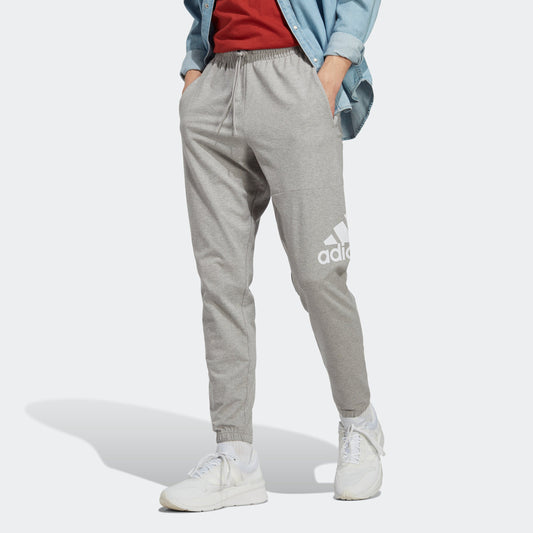 Men's adidas Essentials Single Jersey Tapered Badge of Sport Pants